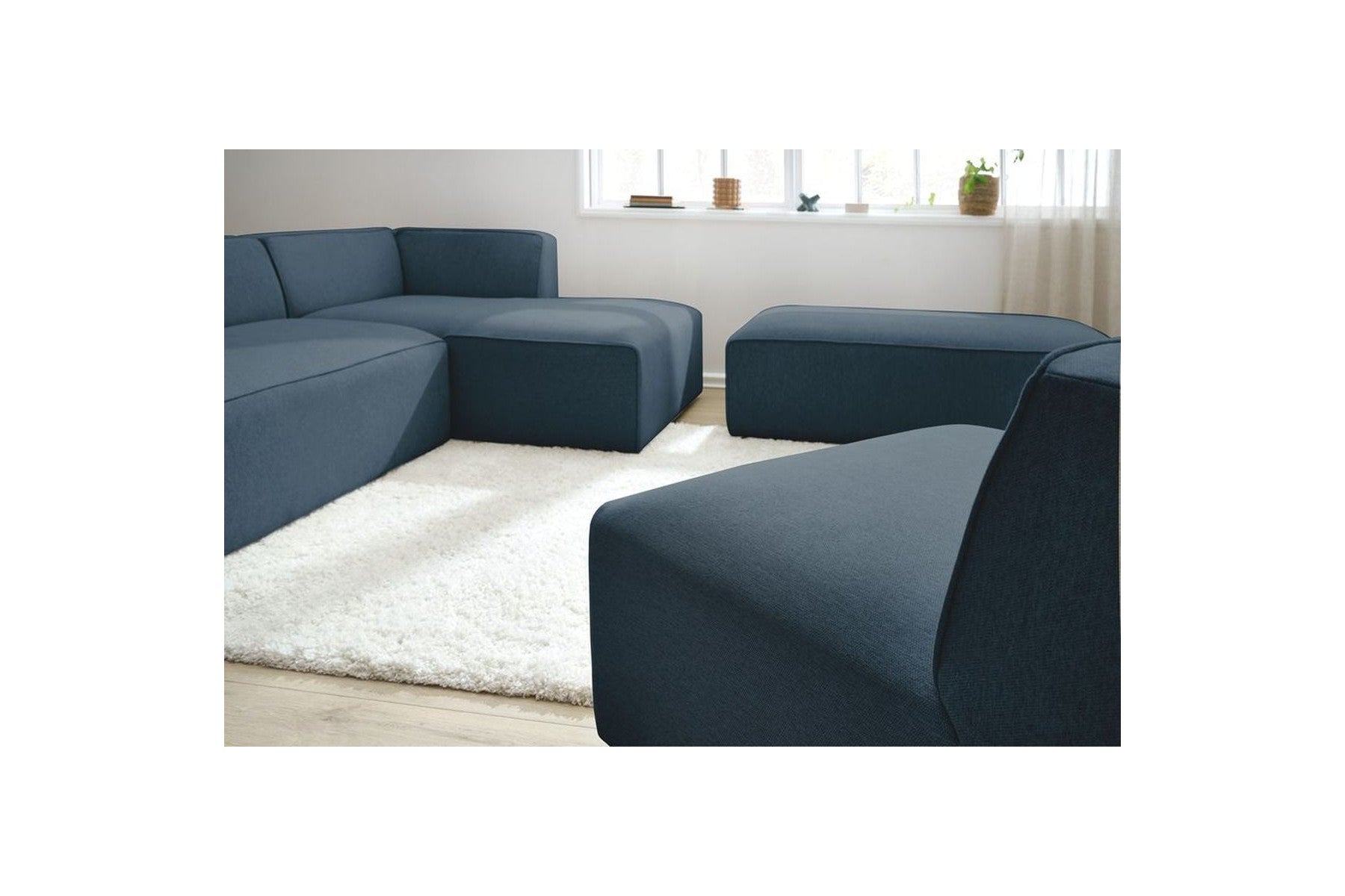 Megeve - Sofá esquinero fijo modular - Tejido liso con 1 módulo sin brazos y 1 puf - Esquina derecha