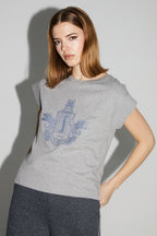 Camiseta plateada con escudo de armas de Robbie fabricada en Portugal