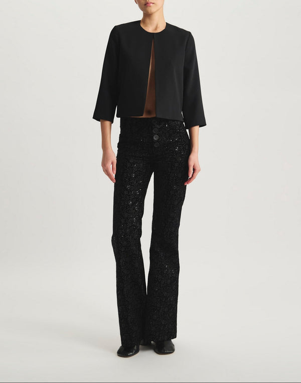 Ines De La Fressange – Magoo Jacket - Black, model wearing a black bolero and black sequinned trousers, front view