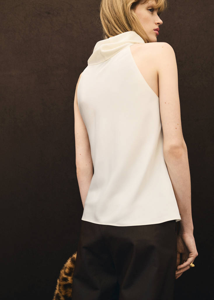 Blusa con collo drappeggiato