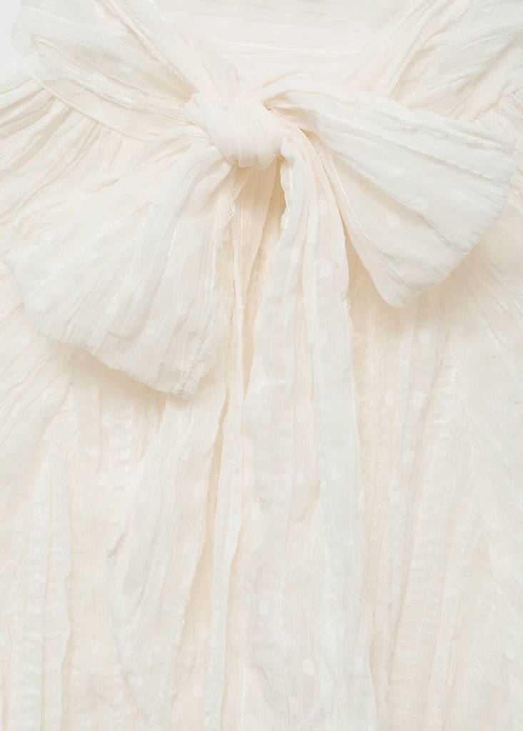 Blusa testurizzata con fiocco