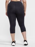 Mallas Capri Adv Essence Plus - Negras - Mujer