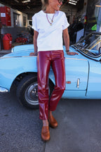 BRUNE red vinyl trousers