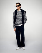 #label: Dren mesure 1,89m et porte une taille M