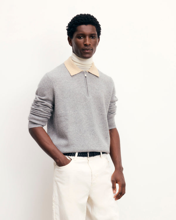 #label: Aziz mide 1,85 m y lleva una talla M