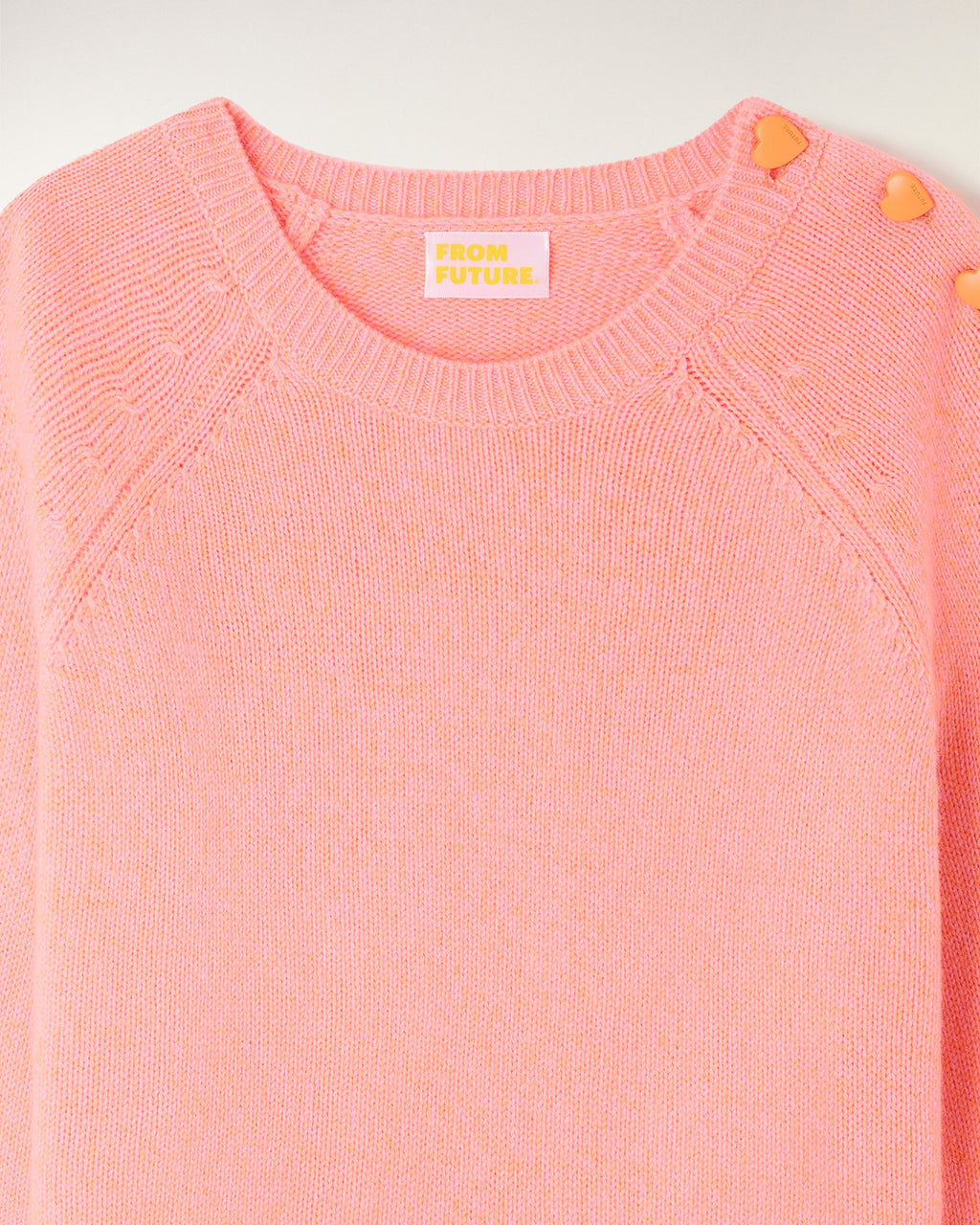 Jersey de cuello redondo con botones de corazón