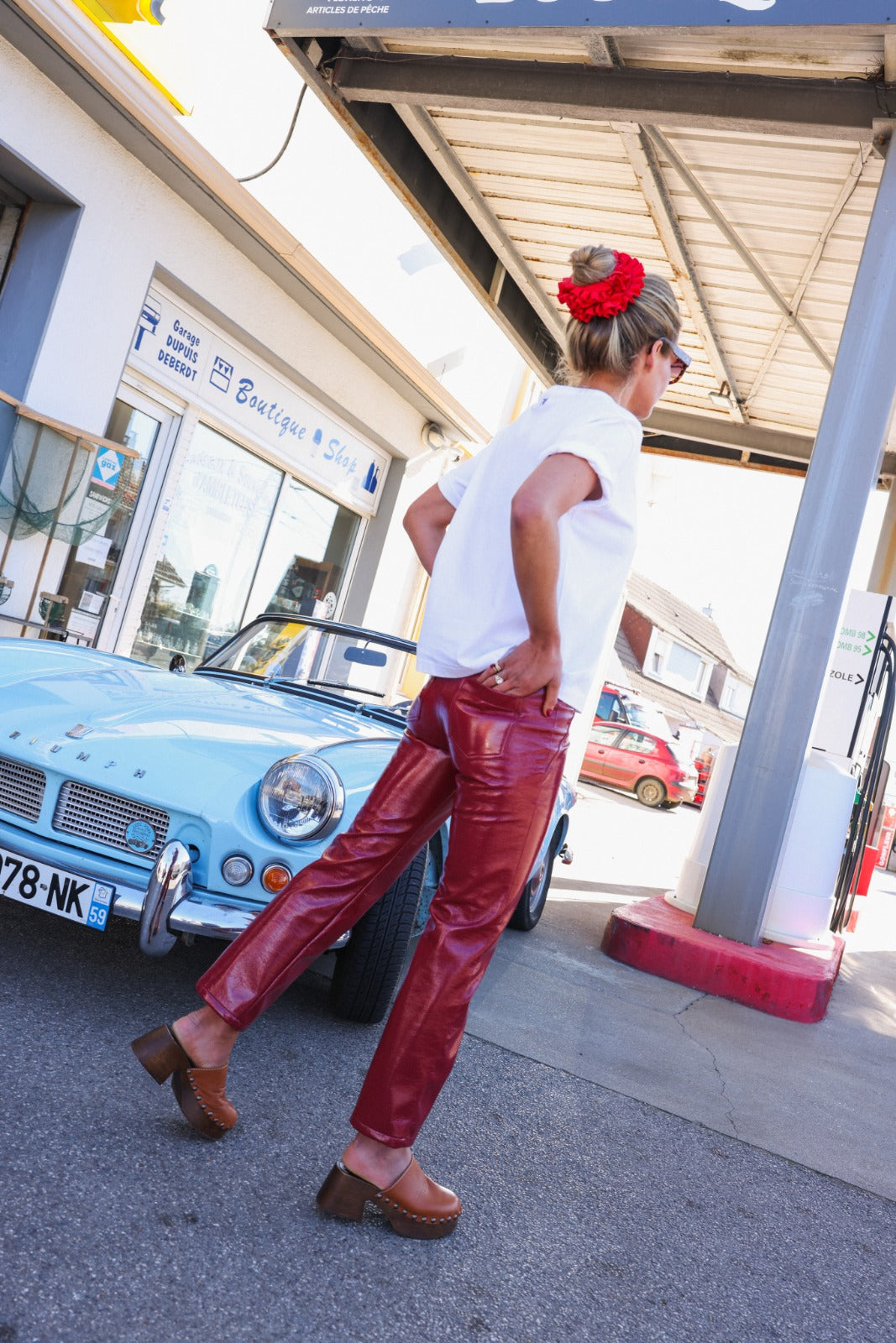 BRUNE red vinyl trousers