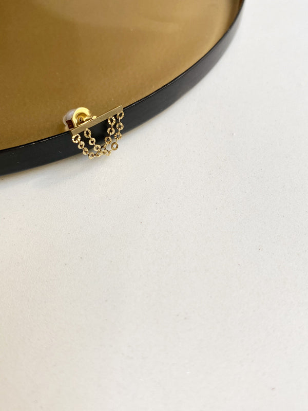 Boucle D'Oreille À L'Unité Sacha