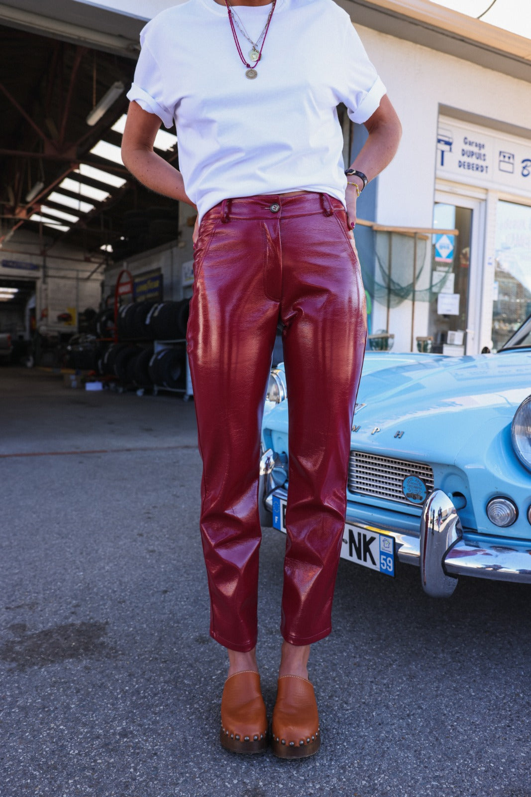 BRUNE red vinyl trousers