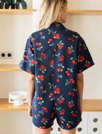Marinblå playsuit med körsbär Rowen