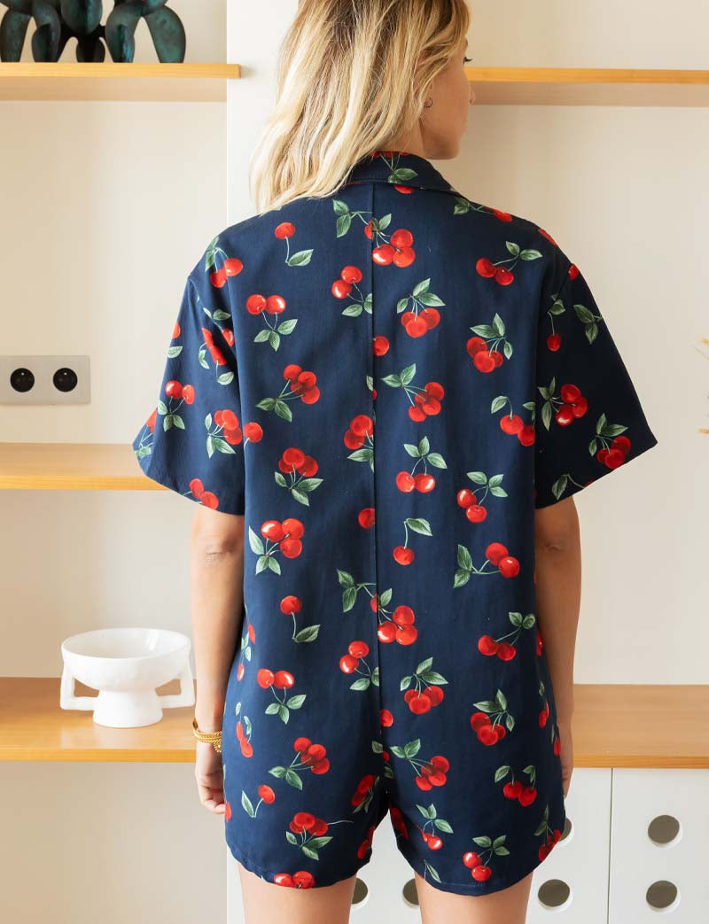 Marinblå playsuit med körsbär Rowen