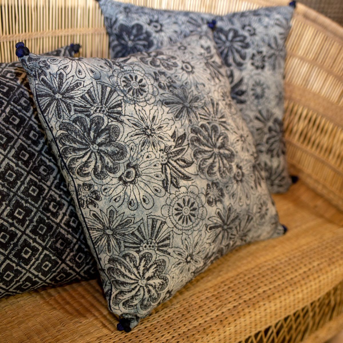 Melting Cushion In Printed Cotton - Blue And Black With Pompoms