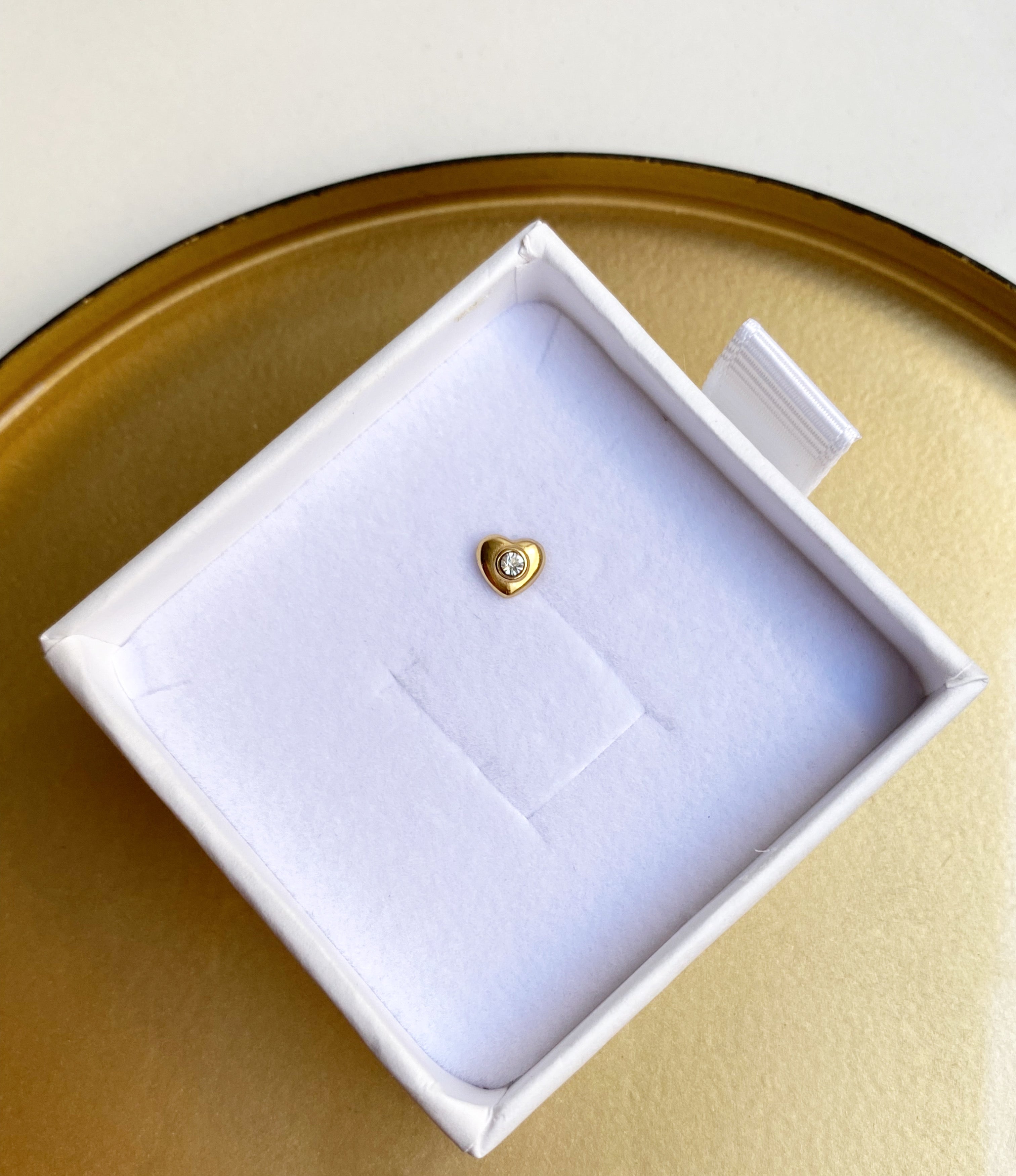 Boucle D'Oreille À L'Unité Greta