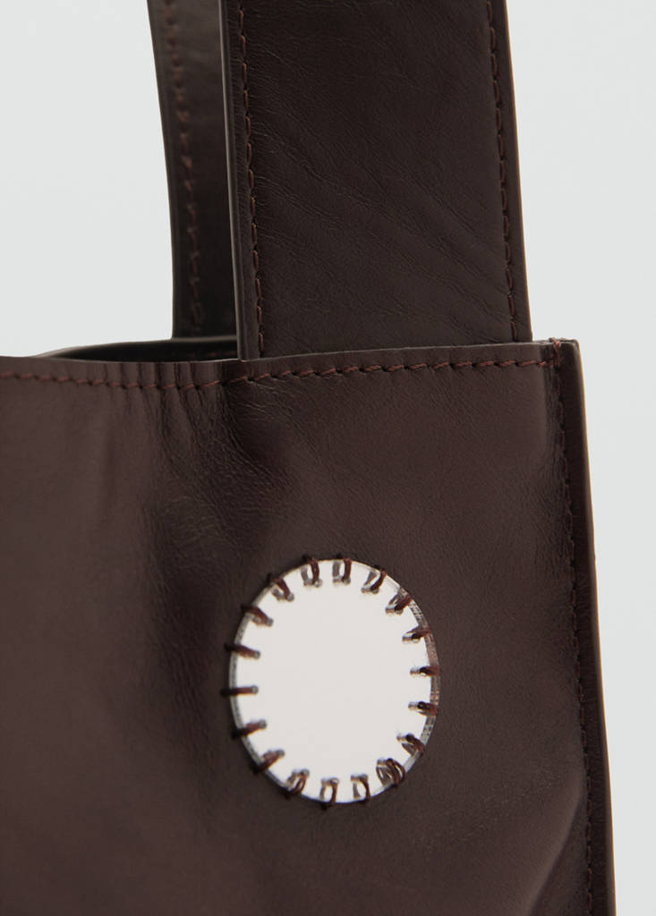 Borsa in pelle con doppio manico e specchi