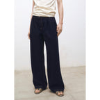 Wide-Leg Pleated Rinse-Wash Jeans