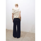 Wide-Leg Pleated Rinse-Wash Jeans