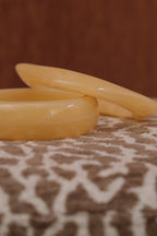 Round ecru resin bangle