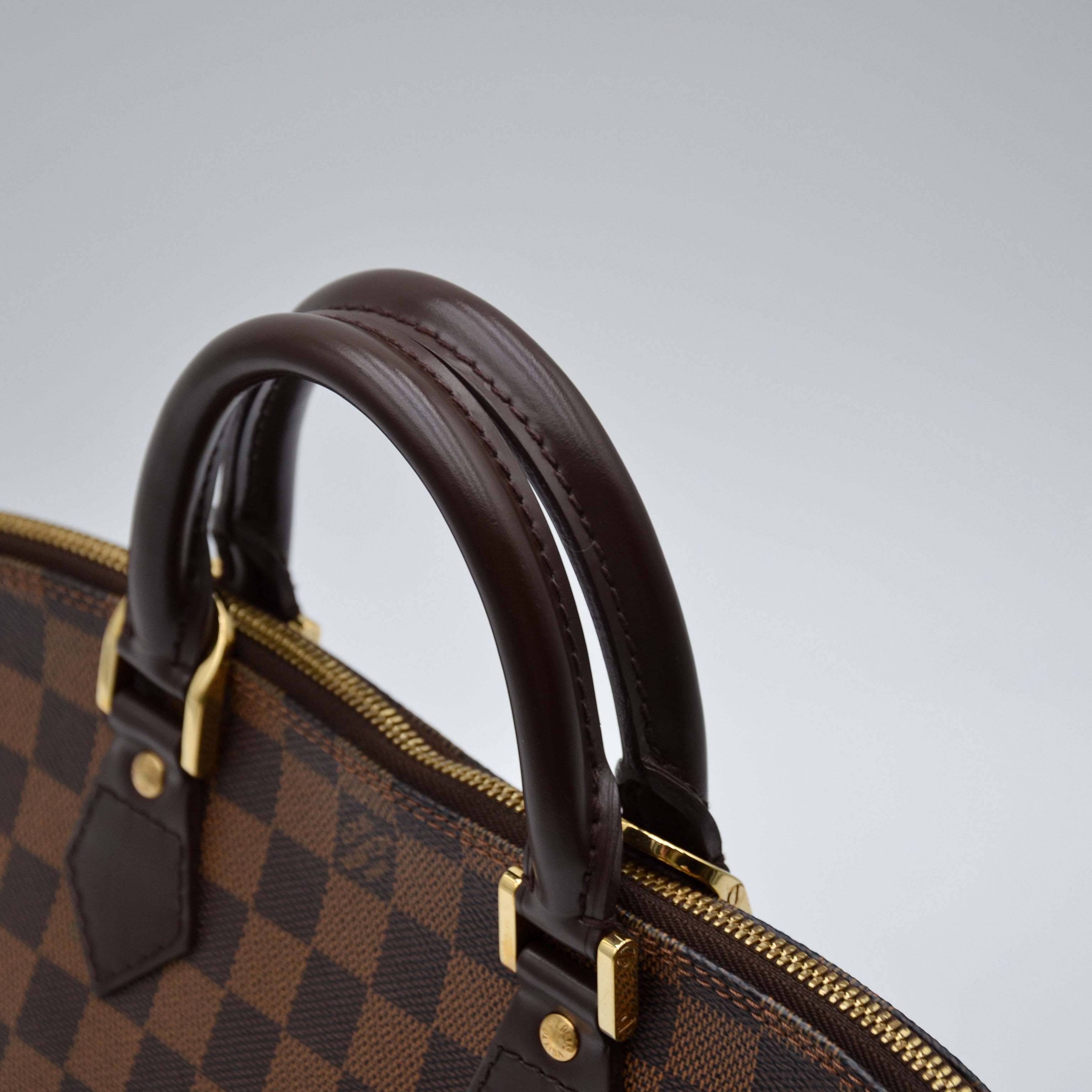 Louis Vuitton Alma PM Damier Ébène Coated Canvas