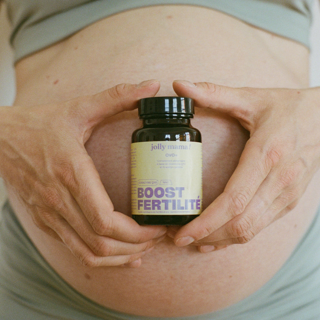 photo of woman with fertility supplement capsules