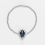 "Blue Tear" Diamond 0.05/15 Sapphire 0.25 Chain Ring - White Gold
