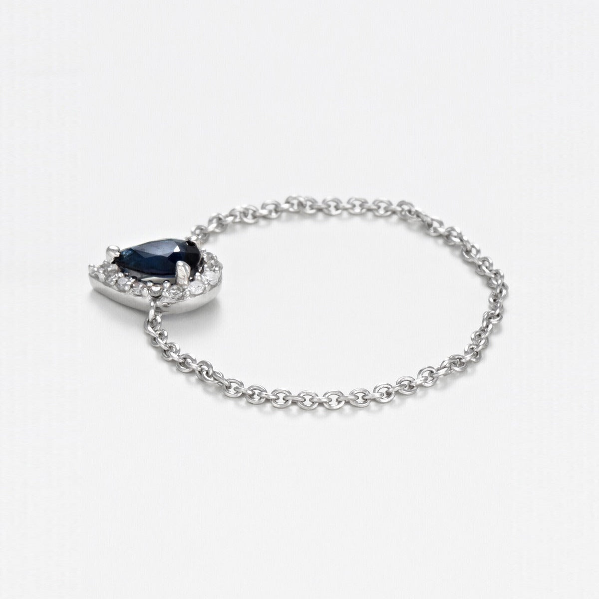 "Blue Tear" Diamond 0.05/15 Sapphire 0.25 Chain Ring - White Gold