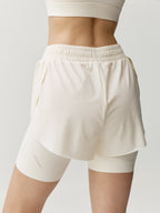 Short Bikila - Tiza Blanca - Mujer