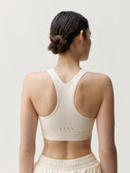 Top Bikila - Tiza Blanca - Mujer