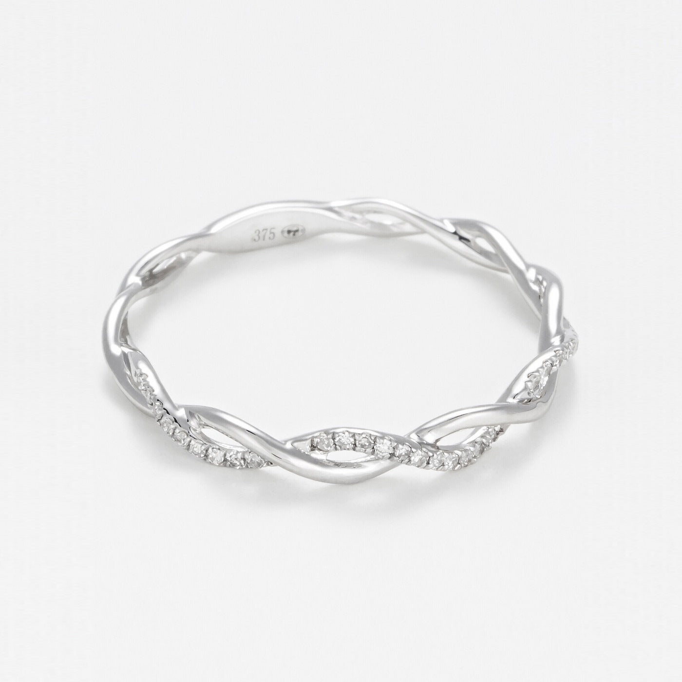 "Twisting" Ring, 0.06 carats/29 mm - 375/1000 White Gold