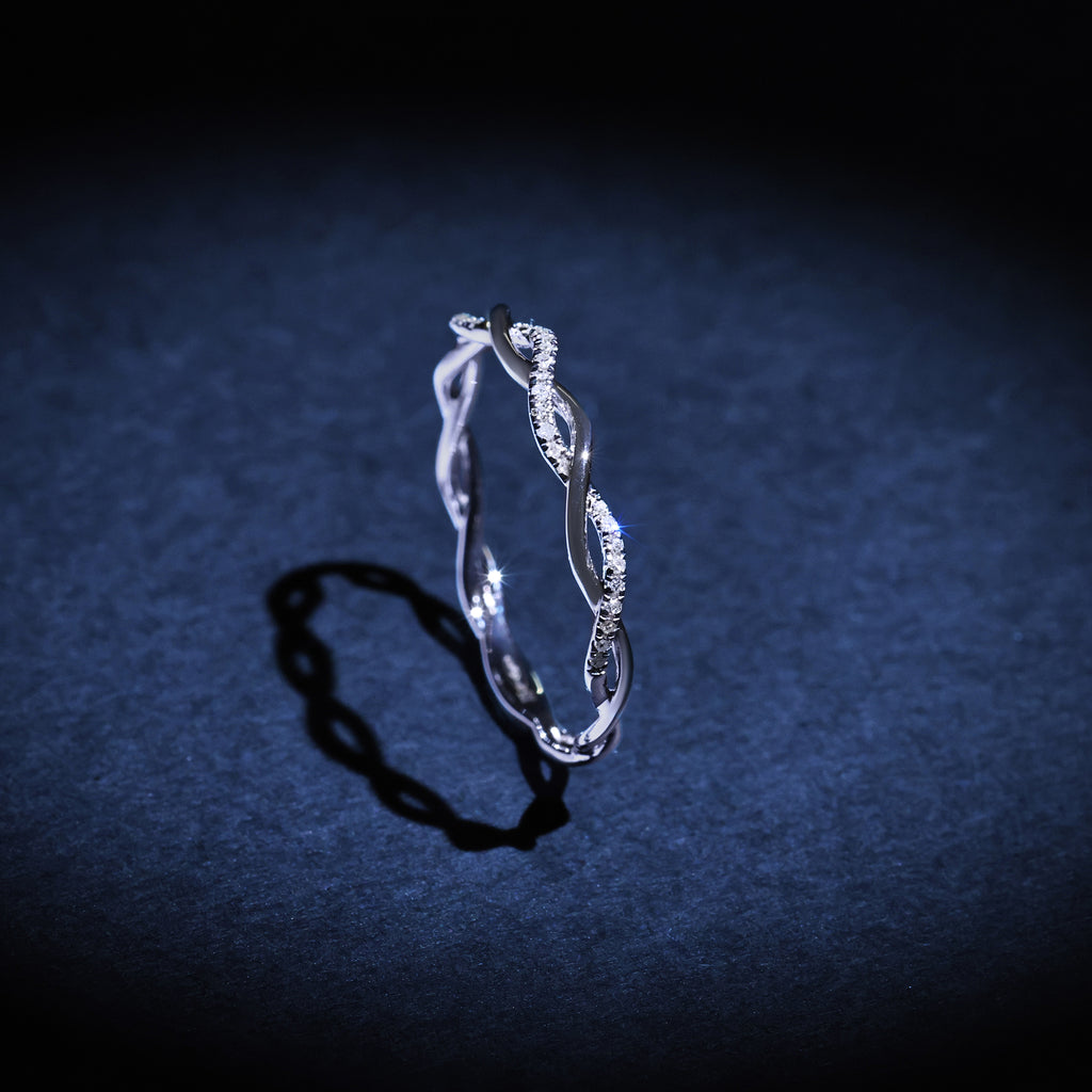 "Twisting" Ring, 0.06 carats/29 mm - 375/1000 White Gold