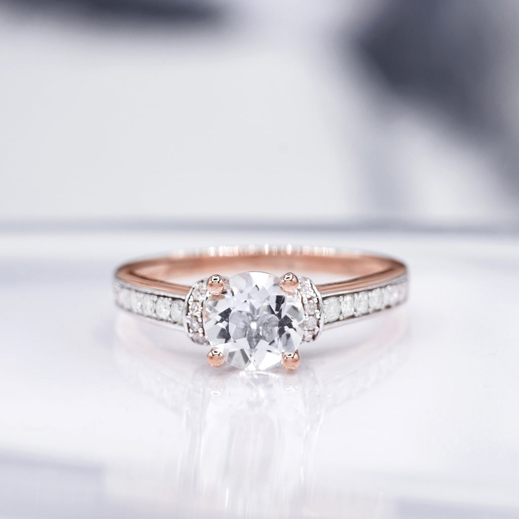 "Chera" Ring D 0,291/40 White Topaze 1,573/1 - Rose Gold 375/1000