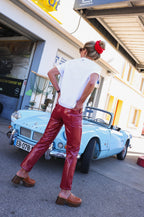 BRUNE red vinyl trousers