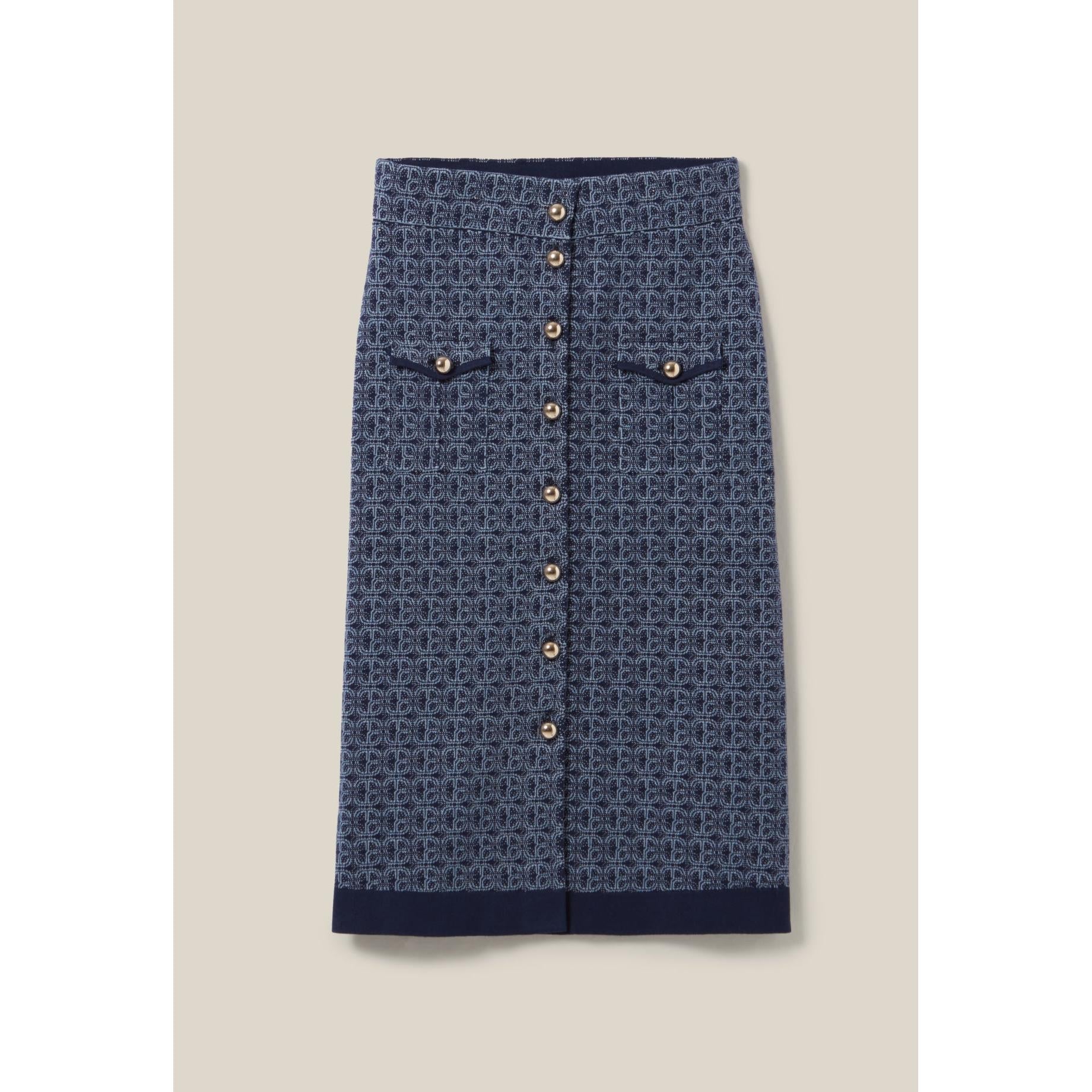 Falda azul marino con monograma de talle alto