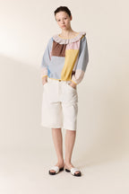 Camisa con parche circular