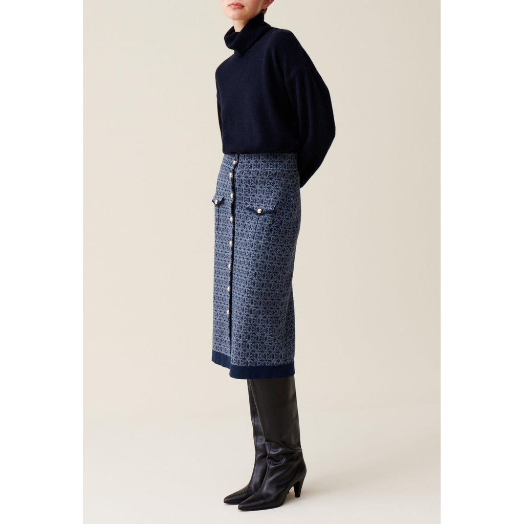 Falda azul marino con monograma de talle alto
