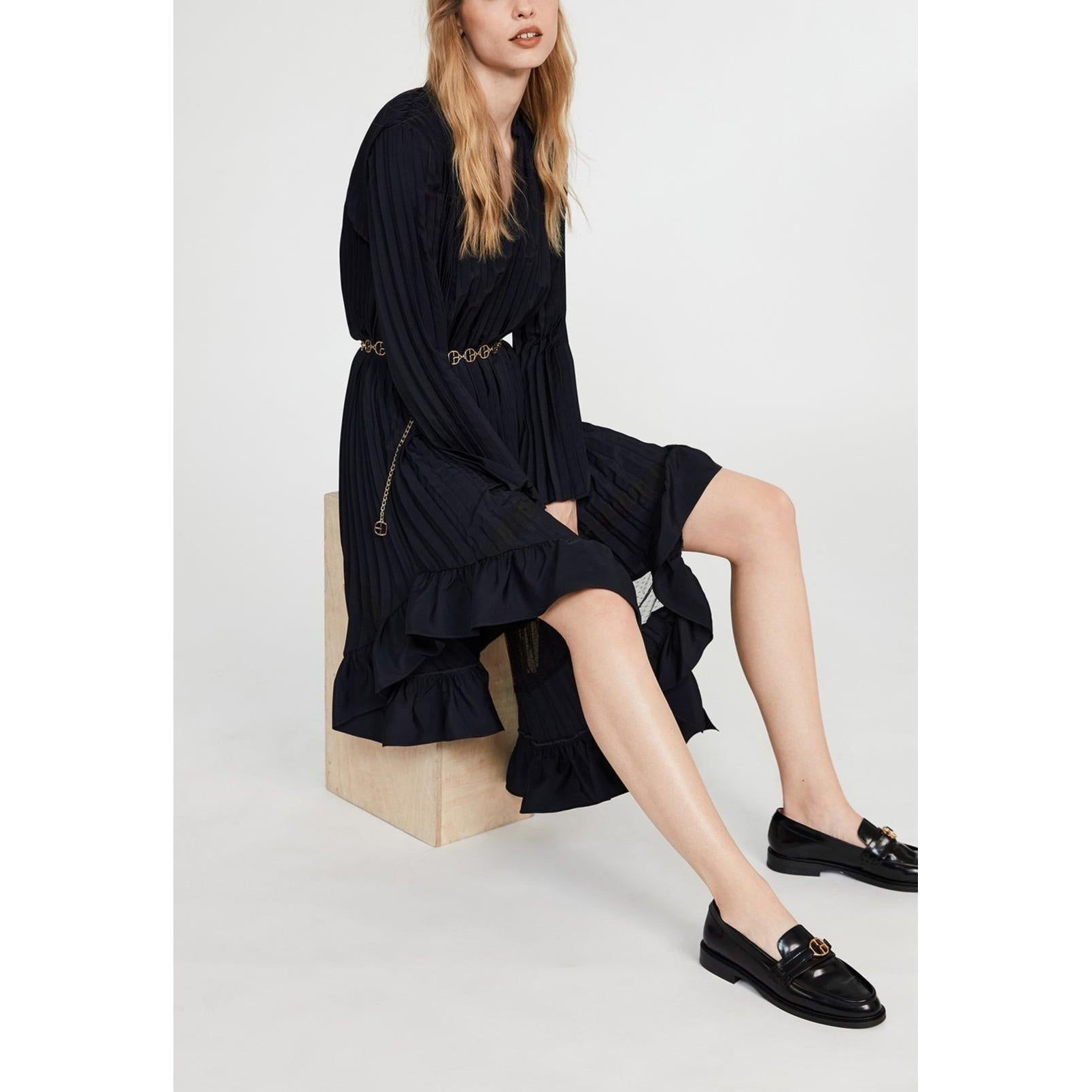 Vestido plisado con volantes