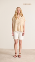 Beige shirt with very short sleeves with white embroidery details and cutouts and gathers for a feminine look Garance Paris