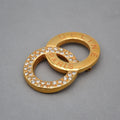 Broche Céline Vintage con anillos entrelazados
