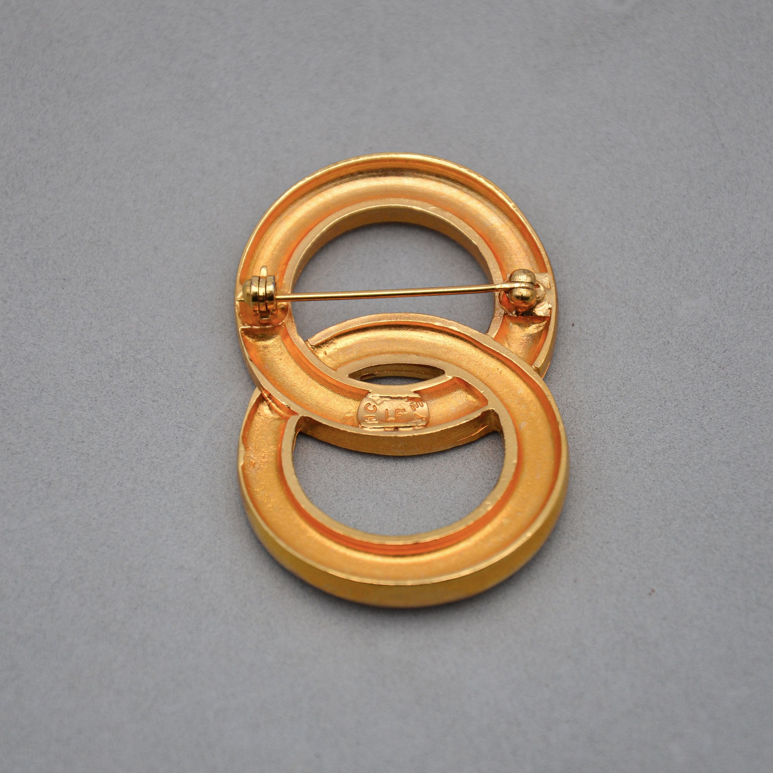 Broche Céline Vintage con anillos entrelazados