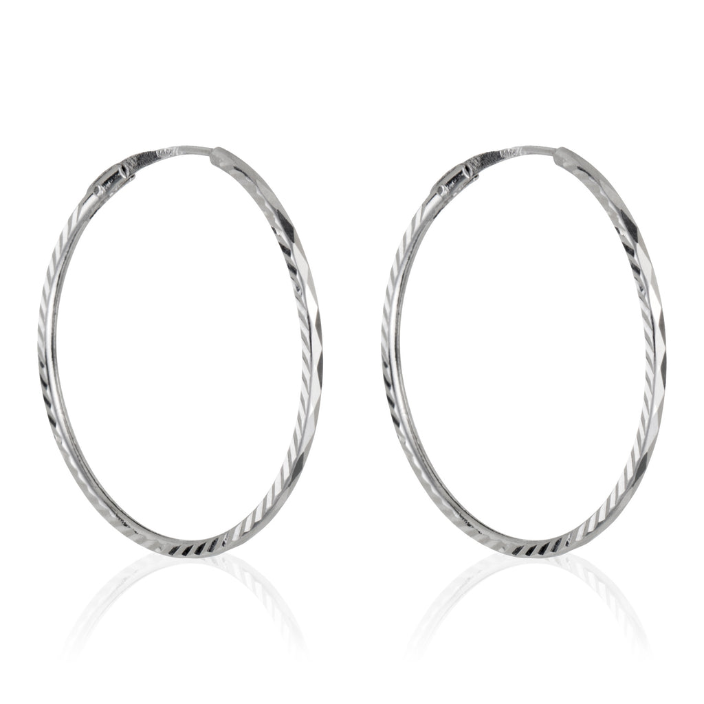 Orecchini "Cerchi a Torciglione 20 Mm" Oro Bianco 375/1000