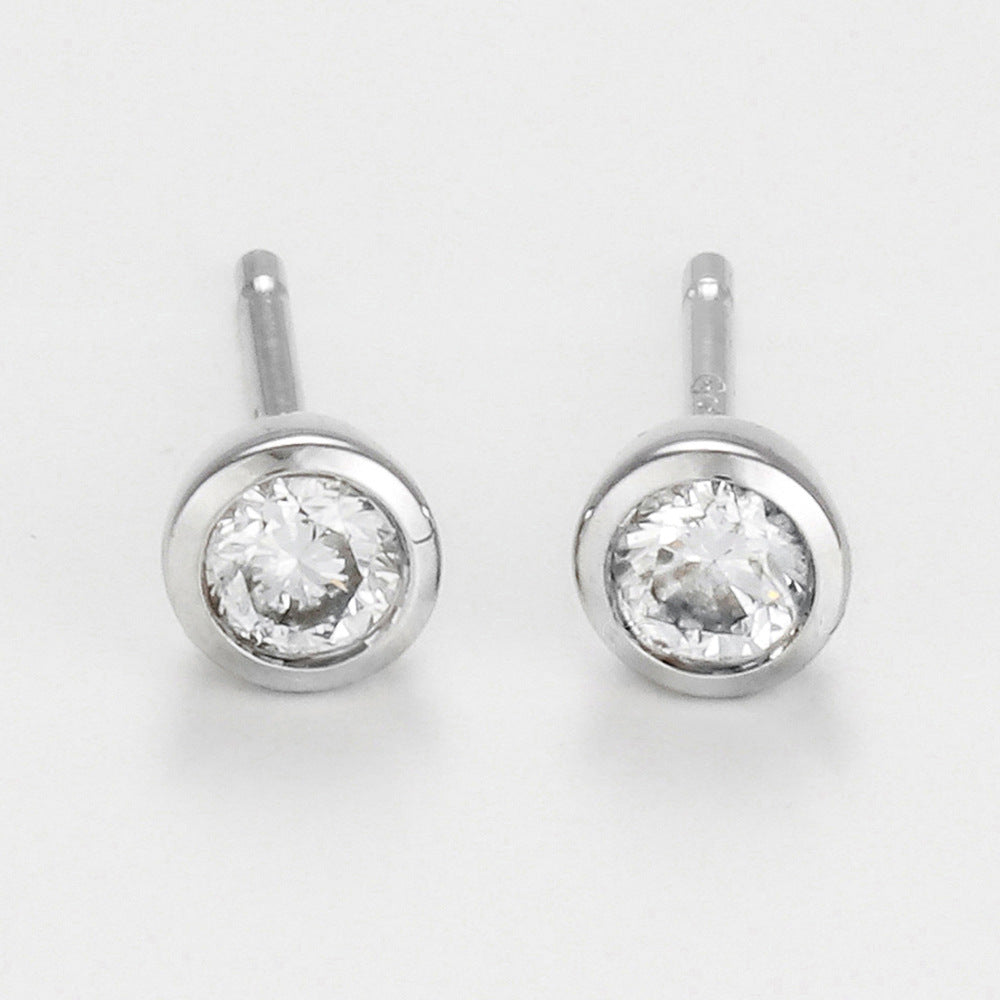 Boucles D'Oreilles "Puces Serti Clos 0,15"