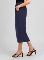 An'ge – Gaella Marine midi skirt, navy blue midi skirt worn by a model, side view