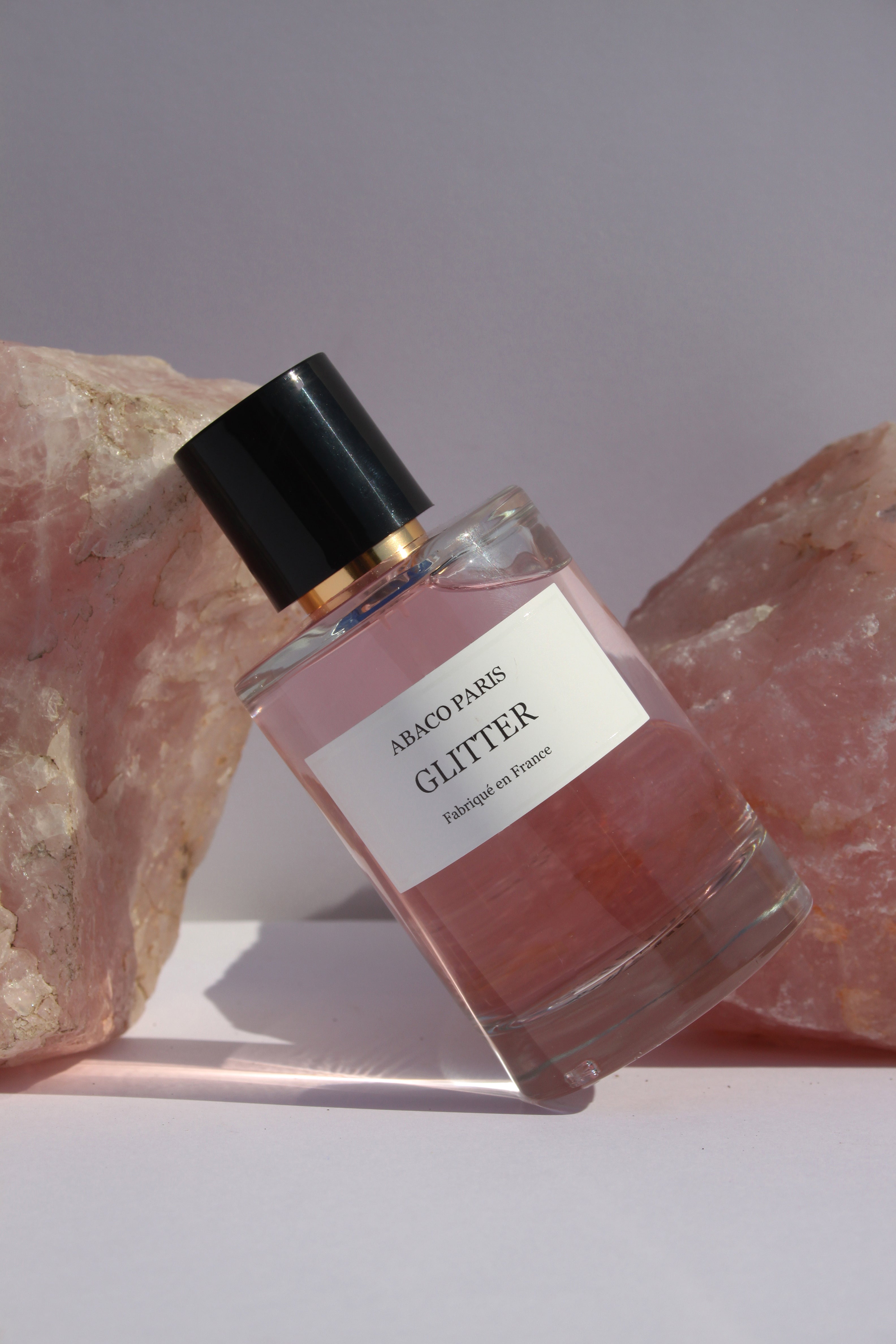 Perfume con purpurina