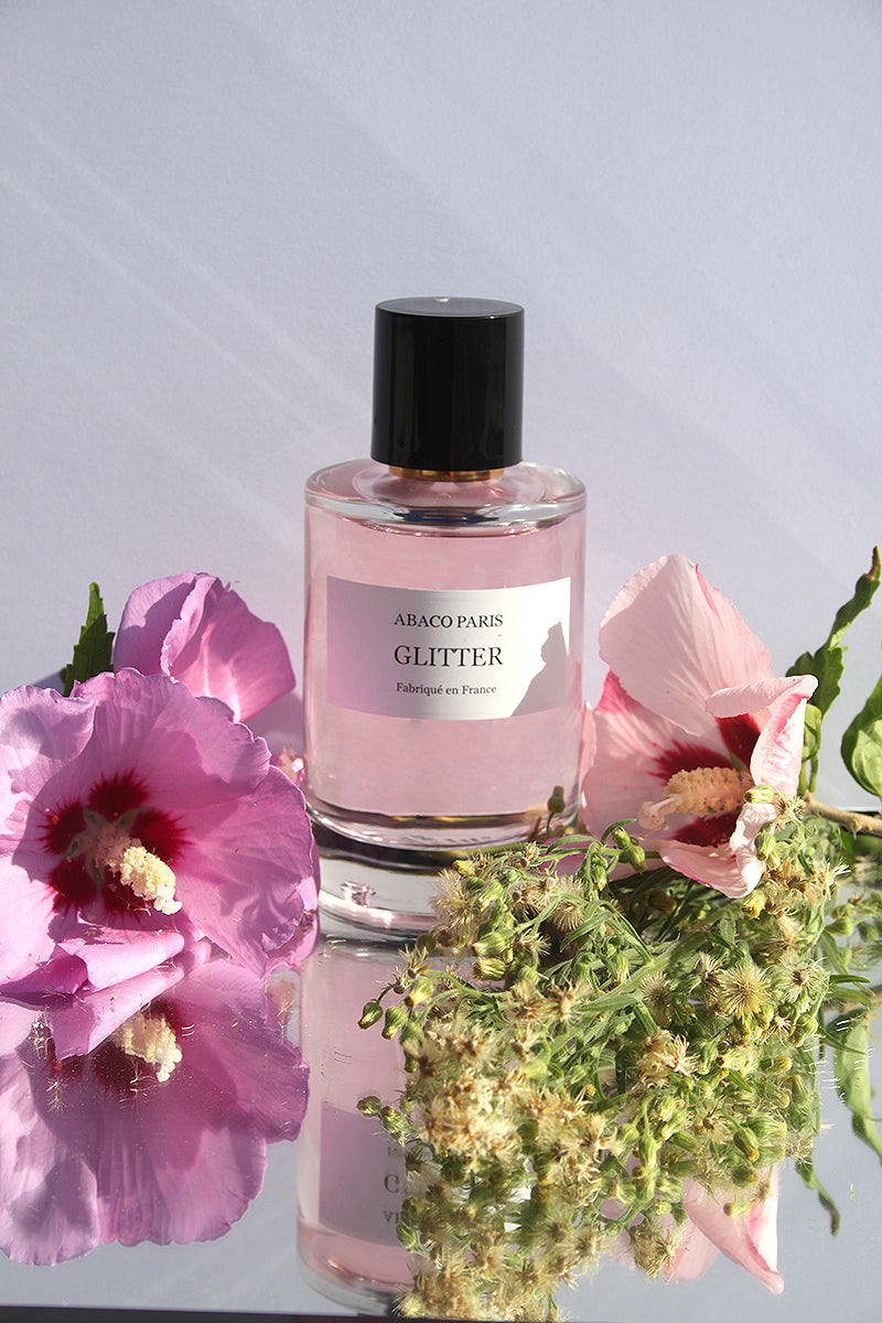 Perfume con purpurina