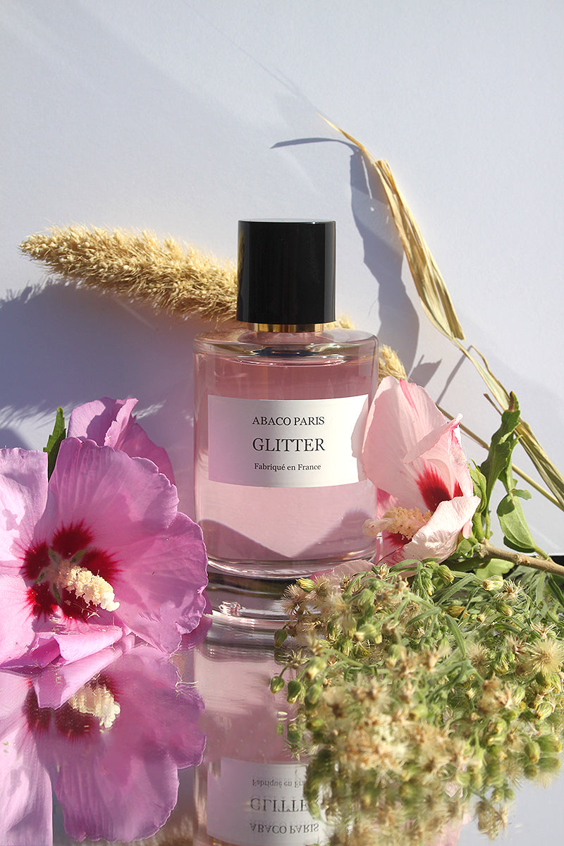 Perfume con purpurina