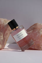 Perfume con purpurina