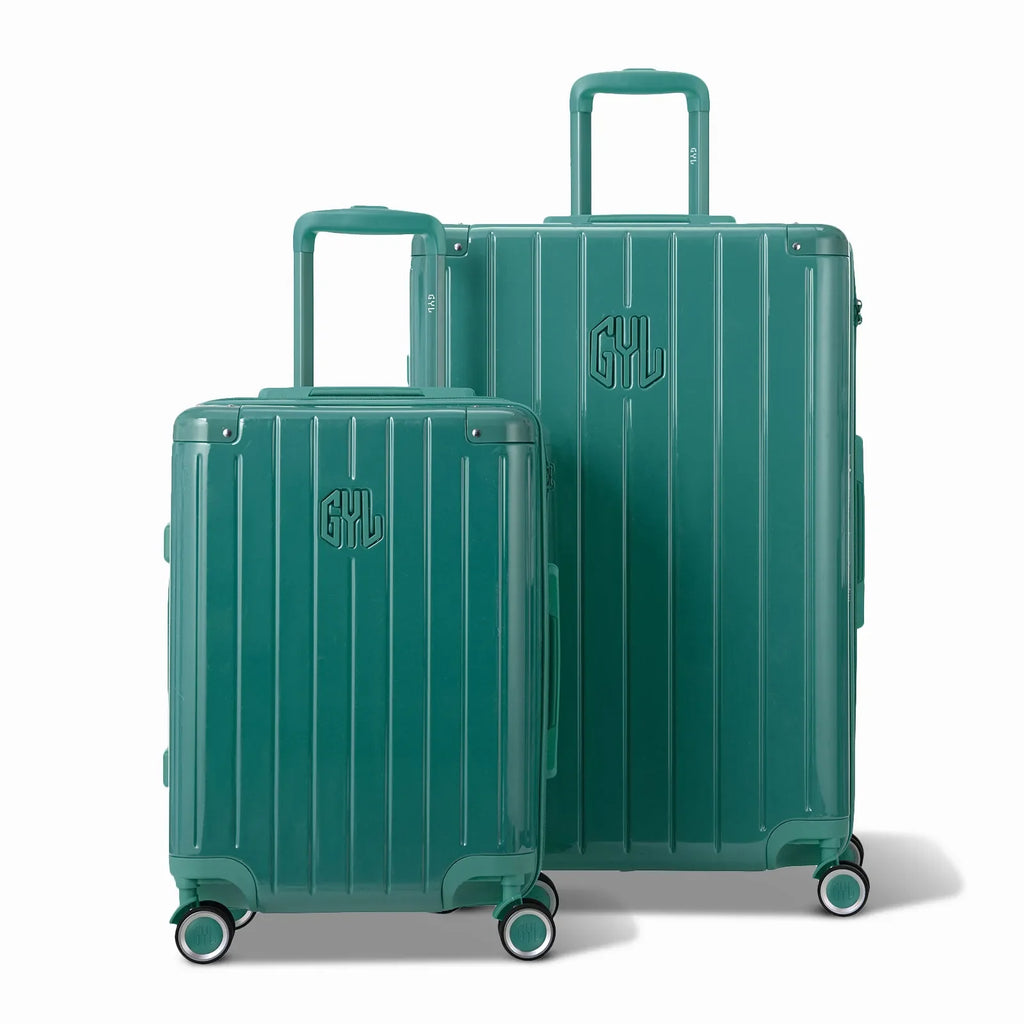 Two GYL Intemporelle water green hard-shell suitcases, cabin and hold sizes, with extended trolley handle. #couleur_vert