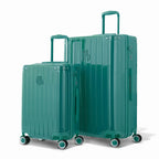 Duo of GYL Intemporelle sea green hard-shell suitcases with ribbed shells and telescopic handles. #couleur_vert