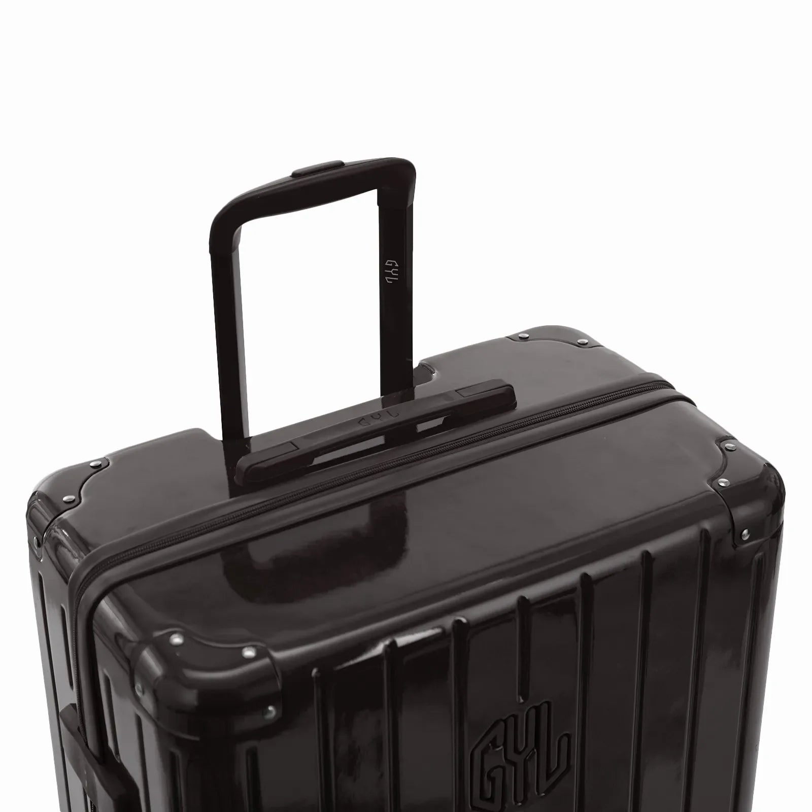 GYL telescopic trolley handle extended on the Intemporelle black polycarbonate suitcase. #couleur_noir
