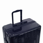 Extended GYL telescopic trolley handle on the Intemporelle navy polycarbonate suitcase. #couleur_marine