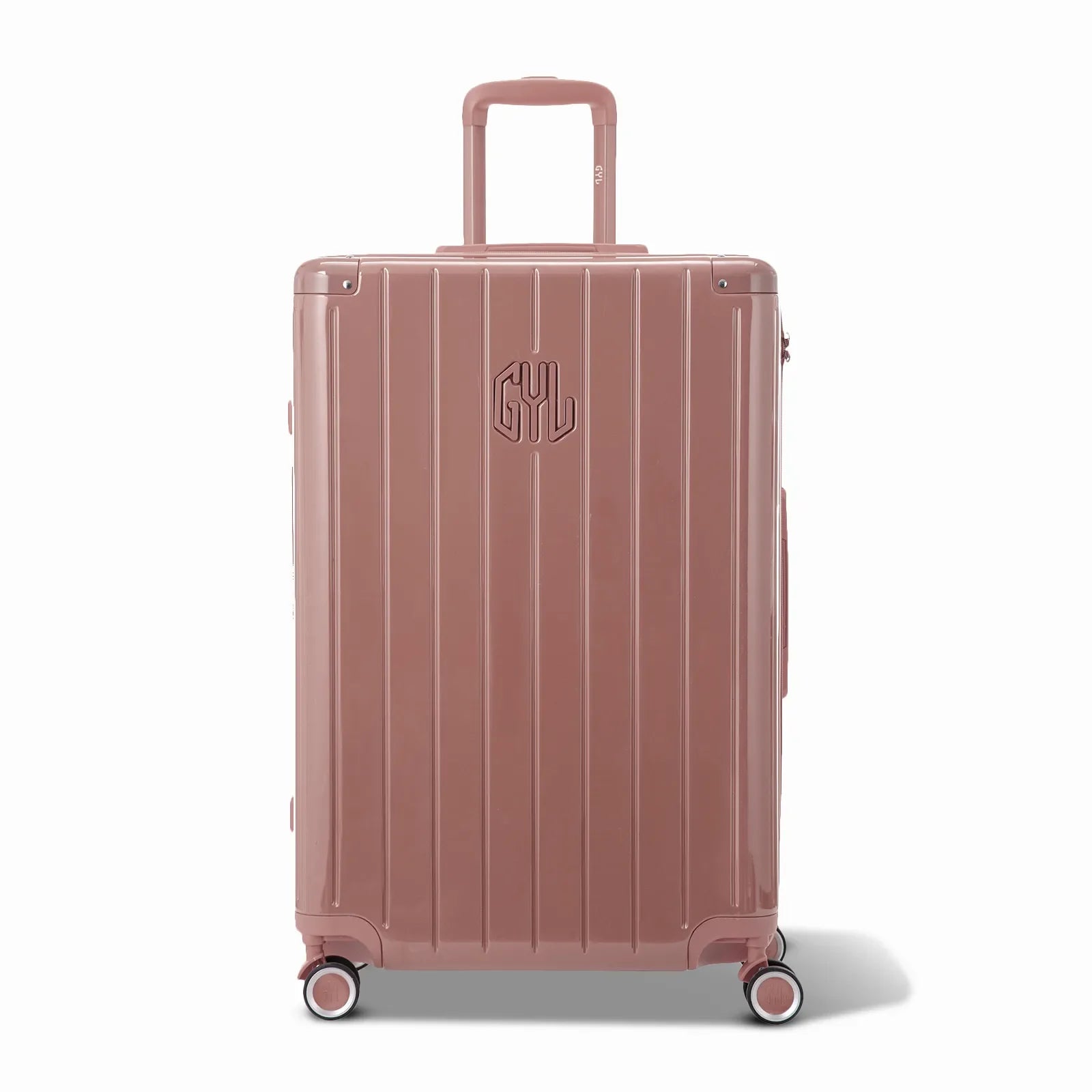 Front view of the GYL Intemporelle rose gold hard-shell suitcase, embossed logo and 360-degree wheels. #couleur_rose gold